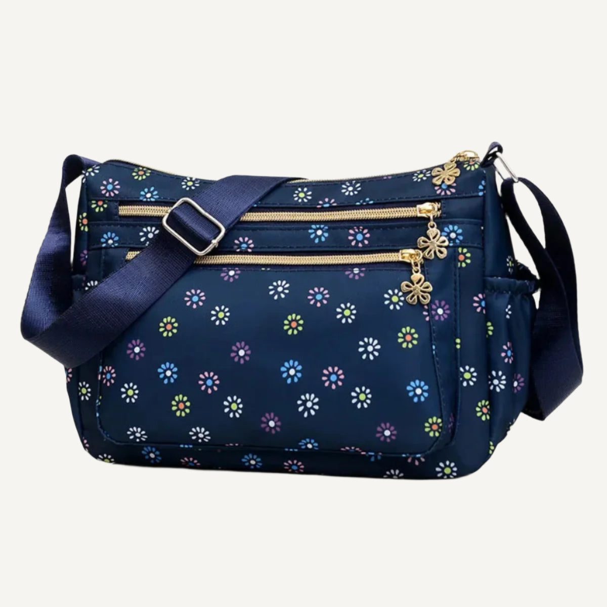 Le sac bandoulière Wanderer pour femme en marine et fleurs